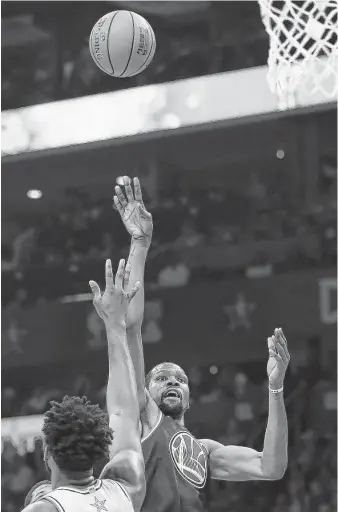  ?? Streeter Lecka / Getty Images ?? Kevin Durant of the Warriors and Team LeBron shoots a jumper against Team Giannis in the first quarter on his way to 31 points and the MVP honor.