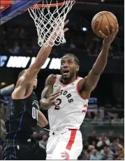  ?? JOHN RAOUX — THE ASSOCIATED PRESS ?? With Kawhi Leonard on their roster, the Toronto Raptors are a team the Warriors could face in the NBA Finals.