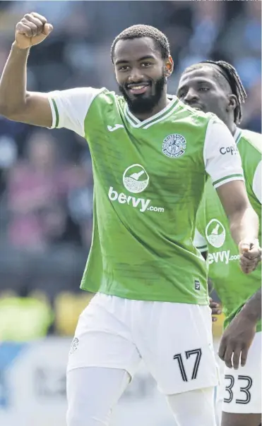  ?? ?? Myziane Maolida celebrates opening the scoring during Hibs' 1-1 draw with Livingston on Sunday