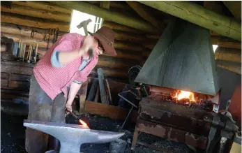  ?? CITIZEN FILE PHOTO ?? Blacksmith Mike Hardeman puts on a demonstrat­ion during Huble Homestead’s annual Spring on the Homestead event in May. The historic site is holding its annual Kids’ Carnival on Saturday.