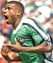  ??  ?? Sunday Oliseh celebrates one of his goals for Nigeria