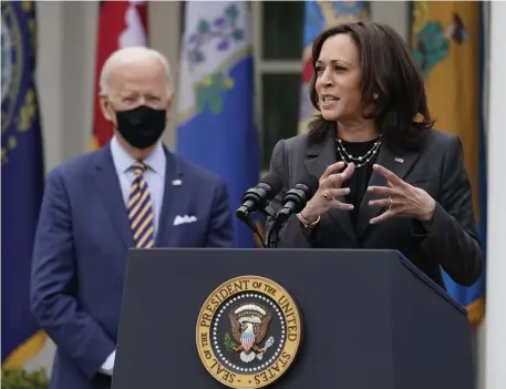  ?? AP FILE ?? TAKING THE REINS: Vice President Kamala Harris speaks about the American Rescue Plan coronaviru­s relief package as President Biden listens on March 12.