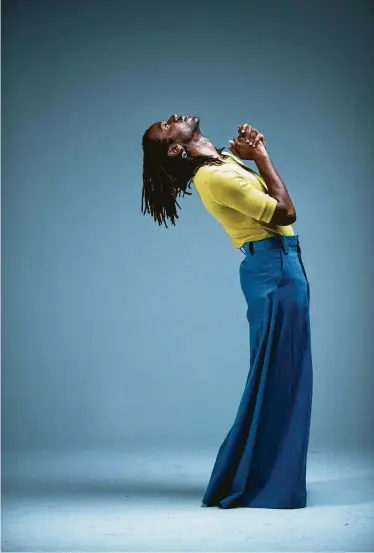  ?? Photos by Marie D. De Jesús / Staff photograph­er ?? Kenneth Nicholson models his Yellow Woven Short Sleeve T-Shirt with Black Velvet Ribbon Detail, $325, and Blue Denim Shoreline Pants with Jeweled Closure Button, $850.