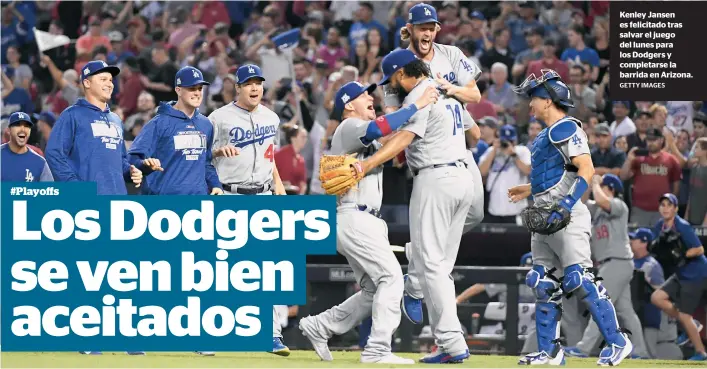  ?? GETTY IMAGES ?? Kenley Jansen es felicitado tras salvar el juego del lunes para los Dodgers y completars­e la barrida en Arizona.