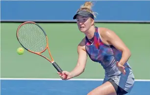  ?? AFP ?? Elina Svitolina returns the ball to Czech Republic’s Katerina Siniakova. —