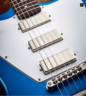  ??  ?? 6 While Eric does make mini-humbuckers, the ones here are by Jason Lollar. “They’re not those really trebly kind of pickups,” says Eric. “They’re full sounding, easy to EQ and seem to work with any amp or pedals”