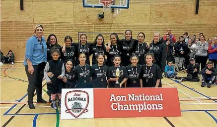  ??  ?? Coach Lana Kershaw with her Waikato Under 15 girls basketball team, featuring Te Aroha College student Breeje Schuler.