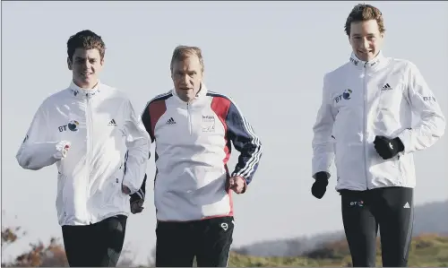  ??  ?? Olympians Jonathan, left, and Alistair Brownlee in training on Otley Chevin, West Yorkshire, with coach Malcolm Brown.
