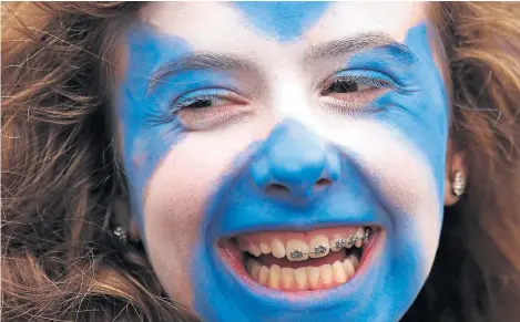  ?? Picture: PA. ?? An independen­ce supporter in Glasgow on the day of the historic vote exactly five years ago.