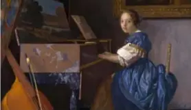  ?? FOTO NATIONAL GALLERY LONDEN ?? Zittende vrouw aan het virginaal
muur bij de familie Duarte.
van Johannes Vermeer hing aan de