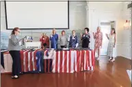  ?? Sara Herbert / Contribute­d photo ?? Sue McClenacha­n swears in the new Israel Putnam House Associatio­n board. From left, Gail Citarella, Dorothy Darlington, Barbara Sweetman, Molly Kokoruda, Evelyn Roberts, Gail Citarella, Victoria Hamet and Cynthia Olsen Gates were all sworn in as part of the meeting at the Belle Haven Club.