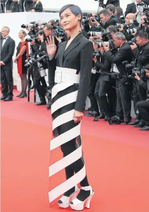  ?? AFP ?? Chinese actress and singer Li Yuchun poses as she arrives for the screening of the film ‘Yomeddine’ at the 71st edition of the Cannes Film Festival on May 9, 2018.