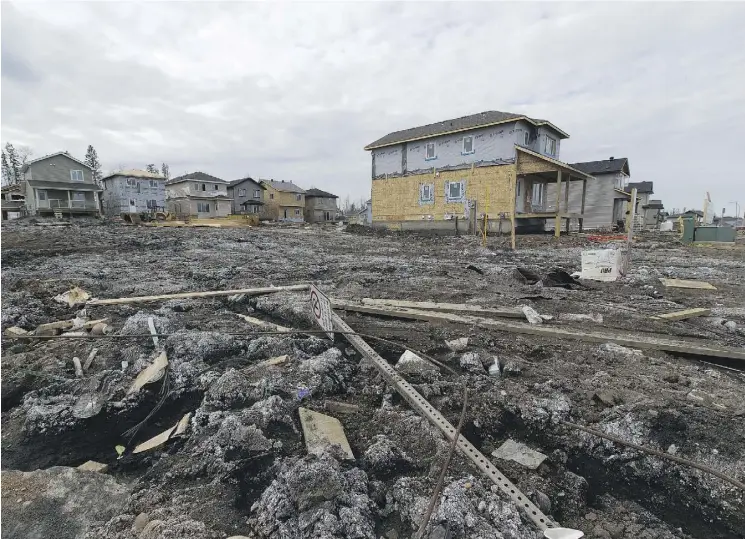  ?? PHOTOS: GREG SOUTHAM ?? It’s not always pretty, but rebuilding is underway in the Stone Creek subdivisio­n, a neighbourh­ood in Fort McMurray badly damaged during last year’s wildfire.