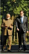  ?? — AP ?? PM Narendra Modi and his Spanish couterpart Mariano Rajoy walk in the gardens of the Moncloa Palace in Madrid, Spain, on Wednesday.