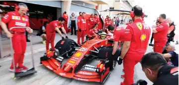  ??  ?? Mick Schumacher sits in Ferrari Formula One car. — Reuters photo
