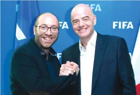  ??  ?? Malta FA President Bjorn Vassallo with Gianni Infantino, the President of FIFA.