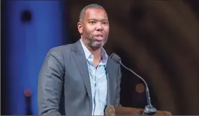  ?? Mary Altaffer / AP ?? Author Ta-Nehisi Coates, the acclaimed essayist and novelist who expanded the world of Wakanda in Marvel comics, will write the script for a new “Superman” film from Warner Bros.