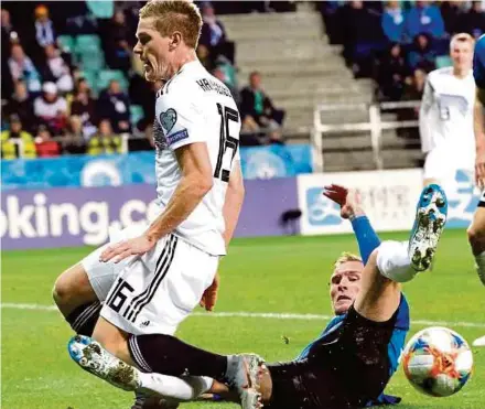  ?? AFP PIC ?? Germany’s Marcel Halstenber­g (left) is challenged by Estonia’s Joonas Tamm in Tallinn on Sunday.