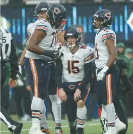  ?? BRIAN CASSELLA/CHICAGO TRIBUNE ?? Bears quarterbac­k Trevor Siemian gets up after being stopped by the Jets on a third-down rushing attempt in the second quarter Sunday at MetLife Stadium in East Rutherford, New Jersey.