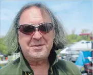  ?? BERND FRANKE THE ST. CATHARINES STANDARD ?? Michael Roche’s support for rowing at Westdale Secondary School in Hamilton knows no ends, even split ends. He dyed his hair green to encourage fundraisin­g for two rowing shells.