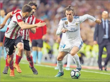  ?? AP ?? Real Madrid left Gareth Bale (right) on the bench till the final 20 minutes. Madrid got the equaliser against Athletic Bilbao in the 87th.