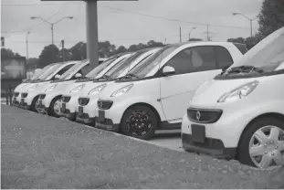  ?? Staff photo by Evan Lewis ?? Smart ForTwo cars are strong sellers at Pete Mankins Nissan. Priced at $6,995, the cars can be filled up at the gas pump for $8 and offer 33 mpg in town and almost 39 on the highway. They have received good safety ratings, the best possible.