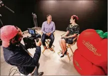  ?? AL SEIB/ LOS ANGELES TIMES ?? Jeff Voris, middle, general manager of Rotten Tomatoes, with Grae Drake, right, senior editor, are filmed by creative director Jimmy Johenning at their Beverly Hills office on July 14. Rotten Tomatoes continues to grow under the Fandango corporate...