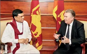  ??  ?? Sir Paul Judge during a meeting with Economic Developmen­t Minister Basil Rajapakse