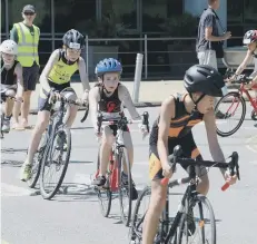  ??  ?? Action from the junior section of last year’s Chichester Trathlon series