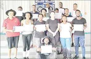  ?? (Courtesy pic) ?? Some of the gymnasts who fimished the three-day course posing with their certificat­es.