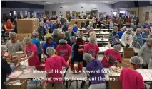  ??  ?? Meals of Hope holds several foodpackin­g events throughout the year.