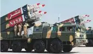  ?? AFP ?? ■ Pakistani military personnel display the short-range surface-to-surface missile NASR at the parade yesterday.