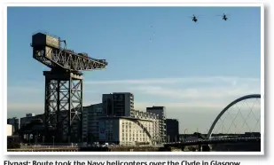  ??  ?? Flypast: Route took the Navy helicopter­s over the Clyde in Glasgow