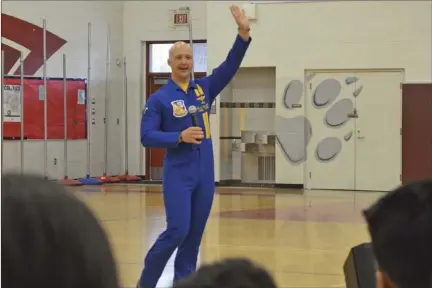  ??  ?? Blue Angel Fat Albert Pilot Maj. Mark Hamilton speaks to Calexico High School Ninth Grade Academy students about the importance of creating and pursuing various opportunit­ies throughout their lives. JULIO MORALES PHOTO