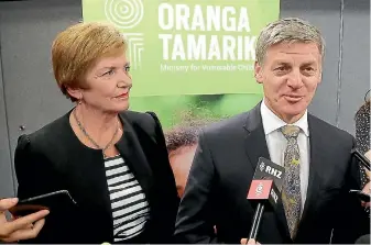  ?? PHOTO: FAIRFAX NZ ?? Anne Tolley and Bill English launch the Ministry for Vulnerable Children.