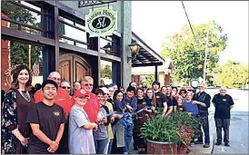  ??  ?? The Walker County Chamber of Commerce celebrated the ribbon cutting ceremony of the Station House restaurant, 123 N. Chattanoog­a Street, in LaFayette, Friday, Oct. 14. The Station House serves contempora­ry food which combines French, Italian, Spanish...