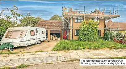  ?? ?? The four-bed house, on Silvergart­h, in Grimsby, which was struck by lightning