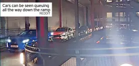  ?? REDDIT ?? Cars can be seen queuing all the way down the ramp