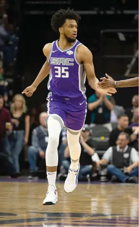  ?? Paul Kitagaki Jr. / Sacramento Bee /TNS ?? Sacramento Kings forward Marvin Bagley III (35) reacts after a basket against the Chicago Bulls on March 17, 2019, at Golden 1 Center in Sacramento.