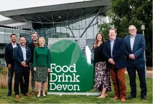  ?? ?? > Food Drink Devon’s board of directors with Ian Cameron of the Met Office outside the Met Office headquarte­rs in Exeter