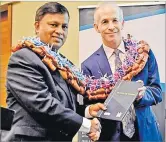  ?? Picture: JONA KONATACI ?? Acting Chief Justice Kamal Kumar (left) and UNICEF representa­tive Sheldon Yett at the launch of Bench Book on Children at the Grand Pacific Hotel yesterday.