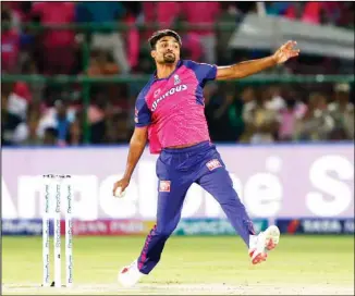  ?? ?? Rajasthan Royals’ captain Sanju Samson bowls a delivery during the Indian Premier League cricket match between Mumbai Indians and Rajasthan Royals in Jaipur, India. (AP)