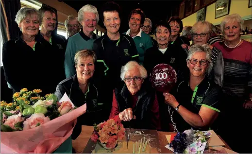  ?? PHOTO / CLINTON LLEWELLYN ?? Jean Foster (centre), flanked by daughter-in-law Sandra Foster (left) and daughter Wendy Fryer, with fellow Waipawa Ladies Golf Club members at a celebratio­n they held for her 100th birthday last Wednesday.