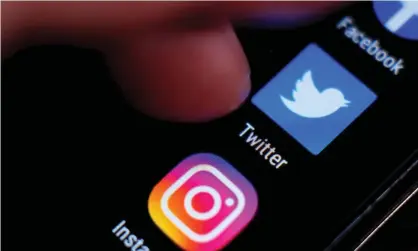  ?? Photograph: Sonia Bonet/Alamy ?? The study does not prove that social media harms wellbeing, but the researcher­s suspect there may be ‘windows of vulnerabil­ity’.