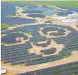  ?? EUROPEAN PRESSPHOTO AGENCY ?? Solar panels are arranged in the shape of pandas at the Datong Panda Power Plant in Datong, Shanxi Province of China. The plant, set to open Aug. 10, has about 1,500 acres of solar panels.