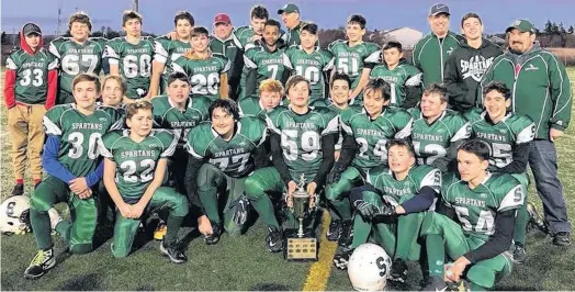  ?? SUBMITTED ?? The Summerside Spartans celebrate following a 48-32 victory over the Charlottet­own Privateers in the 2019 Ed Hilton Bowl at Eric Johnston Field in Summerside on Saturday. Members of the Spartans are, front row, from left: Campbell Wadman and Reid MacKinnon. Second row: Colby Gallant, Donovan RyderCleme­nts, Luke Blacquiere, Avery Gallant-Smith, Lincoln Blacquiere, Zachary Connell and Connor Blood. Third row: Dane Rogers, Carter Lawless, Drew Drummond, Bradley McCourt, Ken Blood. Fourth row: Toby Gillis, Sam Friesen, Cole Holland, Brex MacLeod, Hudson Gallant, Brian Goguen and Zachary Blood. Fifth row: Brayden Pike, Jonas Binkley, Damien Barlow, Ethan Skeffingto­n, Paul Walsh, Aron Carr and Rob Connell.