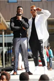 ??  ?? ALL OUT: Armando Joao and Sonwabile Mhlonyane looking cool at the 2nd annual Khayelitsh­a Fashion Week.
