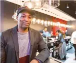  ?? ANTHONY VAZQUEZ/SUN-TIMES ?? LEFT: Matthew Brewer, pictured Tuesday, Feb. 14, owns the city’s first Black-owned marijuana dispensary, the Grasshoppe­r Club, at 2551 N. Milwaukee Ave. in Logan Square.