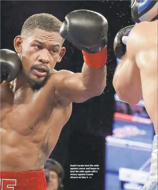  ?? AP ?? Daniel Jacobs beat the odds against cancer and hopes to beat the odds again with a victory against Canelo Alvarez on May 4.