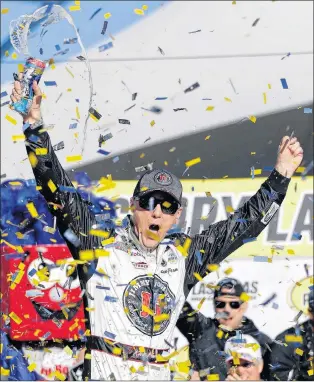  ?? AP PHOTO ?? Kevin Harvick celebrates after winning a NASCAR Cup series auto race Sunday in Las Vegas.